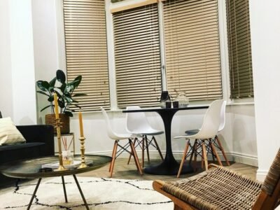 empty-chairs-table-against-building_1048944-11139968